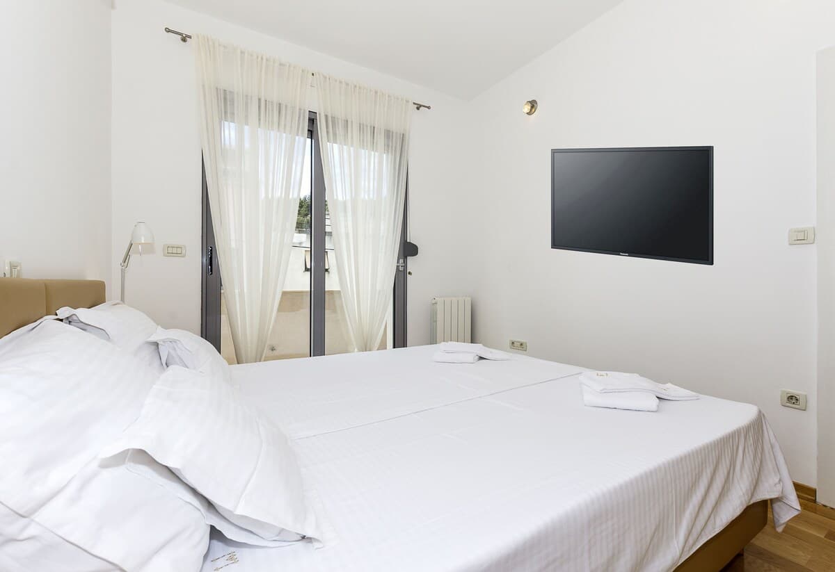Genießen Sie eine ruhige Lage in einem Privathaus, 10 Minuten vom Stadtzentrum entfernt - Schlafzimmer